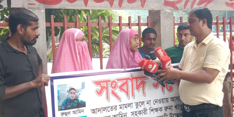 এসবি’র পুলিশ সদস্য রুহুল আমিনের বিরুদ্ধে সুদের টাকা আদায়, বিদেশে লোক পাঠানো মামলায় ফাঁসানো ও নির্যাতনের অভিযোগ